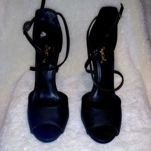 Black high heels crossover